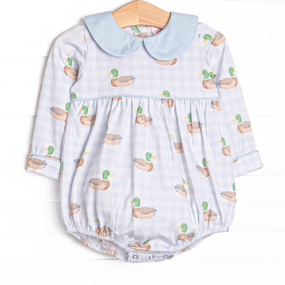 This bubble features a blue gingham duck print, a blue peter pan collar, and snaps on the stride.