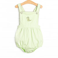 This bubble features a green material, snaps on the stride, and a crocodile applique.