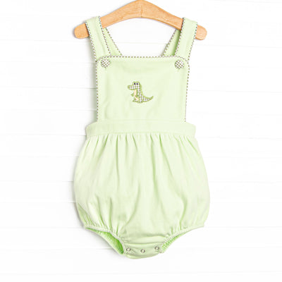 This bubble features a green material, snaps on the stride, and a crocodile applique.