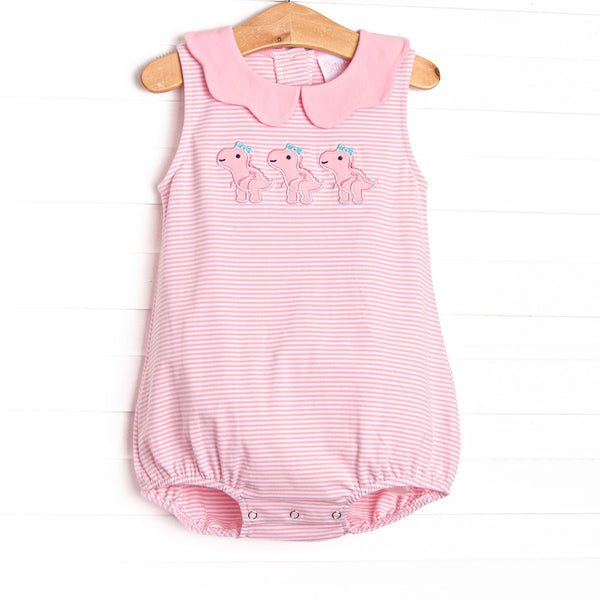 This bubble features a pink striped print, pink scalloped collar, and trio of dinosaur appliques