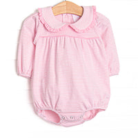 This cozy knit favorite is a staple for every little girl's closet. Featured here in pink&nbsp; stripes and pink peter pan collar with ruffle trim!
