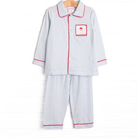 Our Smocked Santa Lounge Set includes soft blue stripes, red piping, and a smocked Santa Claus.&nbsp;