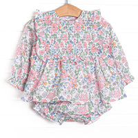 This set features a long sleeve top in a pink floral print with pink ruffles and long sleeves. Coordinating floral diaper cover to match.