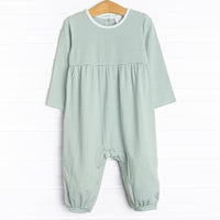  The Romper features long sleeves, snaps in the stride to make changing a breeze, and soft knit material. 