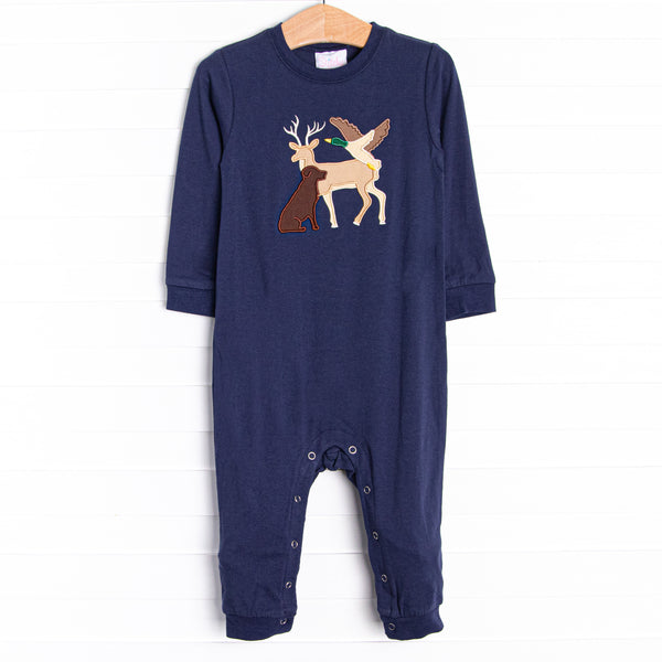 This romper features the softest navy blue knit material, snaps on the stride, and a deer, dog, and duck applique.