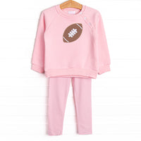 This set features a pink sweatshirt with a football applique, button details, and pink striped leggings to match.