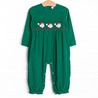 This romper features a green corduroy material, snaps on the stride, and Santa Claus smockings.