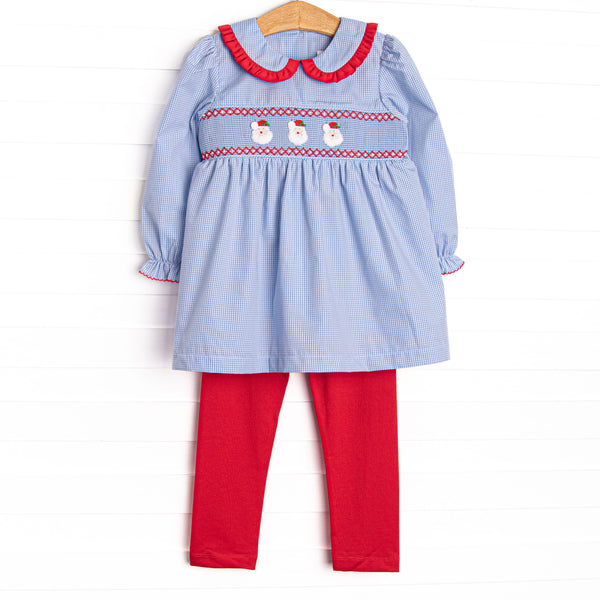  This set features a blue mini gingham print, red ruffle trim peter pan collar and a Santa Claus smocking. 