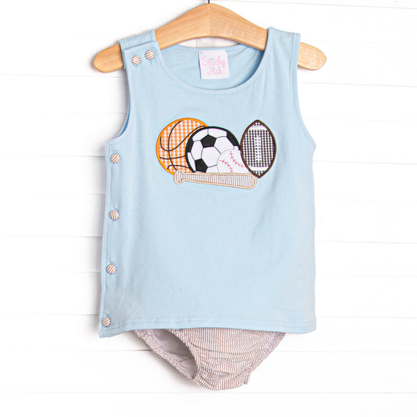 This set features a blue knit top with&nbsp;a variety of sports ball appliques and tan seersucker diaper cover to match.