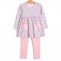  A long sleeve top in a pink floral print with ruffle pocket details, trim around neck, waist and end of sleeves, and coordinating pink leggings to match. 