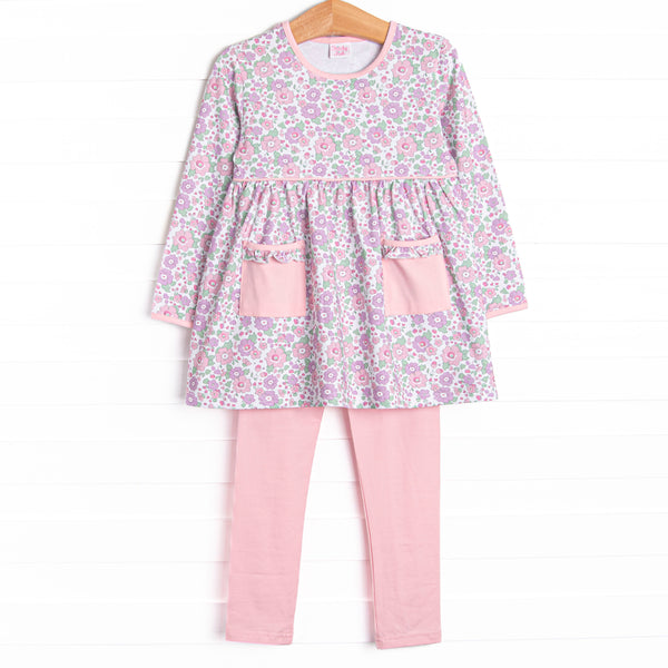  A long sleeve top in a pink floral print with ruffle pocket details, trim around neck, waist and end of sleeves, and coordinating pink leggings to match. 