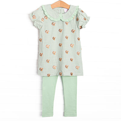 This set features sage gingham material, a turkey embroidered design, a fun trimmed collar, and leggings to match.