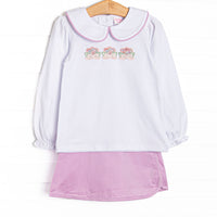 This set features white knit fabric, floral appliques, and a white Peter Pan collar. Coordinating purple corduroy skirt to match.
