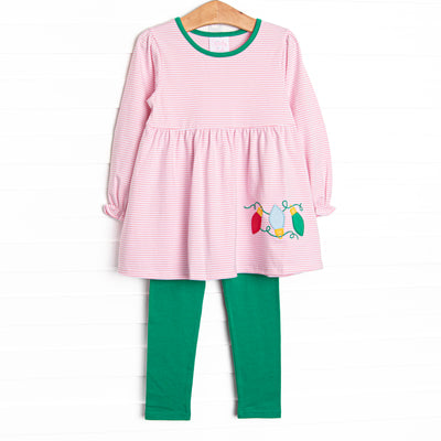 This set features a pink striped print, green trim, and Christmas light appliques. Coordinating green leggings to match.