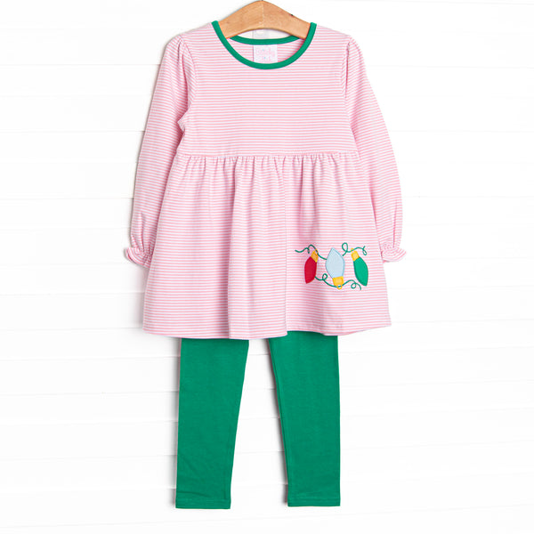 This set features a pink striped print, green trim, and Christmas light appliques. Coordinating green leggings to match.