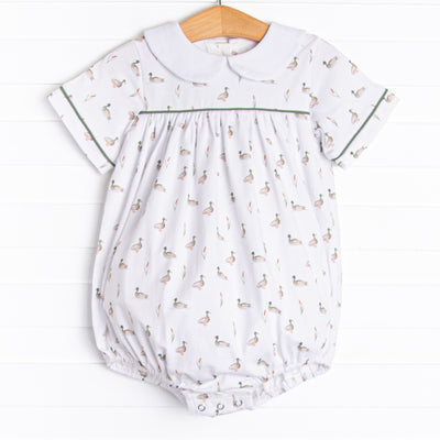 This bubble is featured in the softest knit material with mallard print and picot trim around the collar. Button closure on back and snaps on the stride.