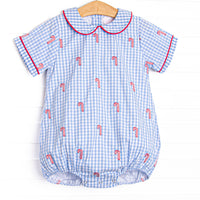  This bubble features a blue gingham print, short sleeves, and candy cane embroideries. 