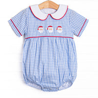 This bubble features a blue gingham print, a peter pan collar with red pipping, and a trio of Santa embroideries. 