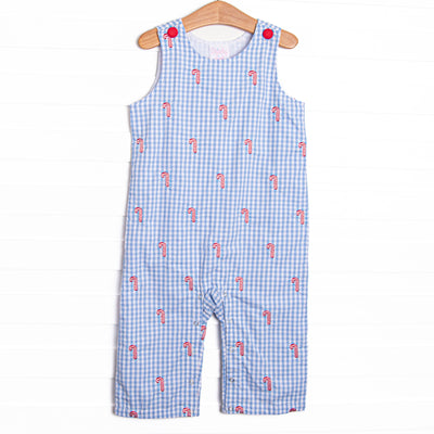  This Jon Jon features a blue gingham print, front covered buttons, and candy cane embroideries. 