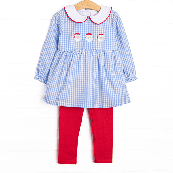 This set features a blue gingham print, a peter pan collar with red pipping, and a trio of Santa embroideries. Coordinating red leggings to match.