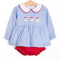 This set features a blue gingham print, a peter pan collar with red pipping, and a trio of Santa embroideries. Coordinating red diaper cover to match.