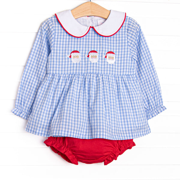 This set features a blue gingham print, a peter pan collar with red pipping, and a trio of Santa embroideries. Coordinating red diaper cover to match.