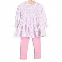  This set features pink floral print, chest smocking, and eyelet lace trim. Coordinating pink leggings to match. 