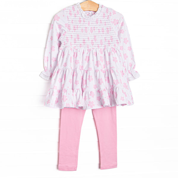  This set features pink floral print, chest smocking, and eyelet lace trim. Coordinating pink leggings to match. 