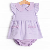 The set features purple stripes, ruffle trim, and purple knit diaper cover.