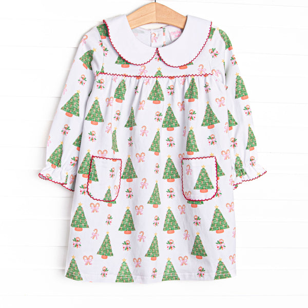  This dress features a Christmas tree print, a peter pan collar, and red picot trim. 