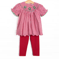  This set features a red gingham print, puff sleeves, and a trio of wreath smockings. Coordinating red leggings to match. 