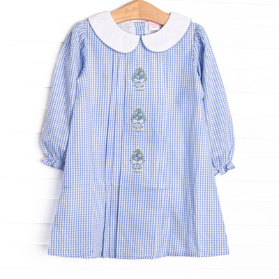 This dress features a blue gingham print, a peter pan collar, and Christmas Tree embroidery.