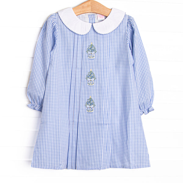 This dress features a blue gingham print, a peter pan collar, and Christmas Tree embroidery.