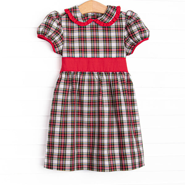 This dress features a red plaid print, puff sleeves, and red sash.