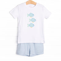 This set features a short sleeve top with a trio of fish appliques and a blue striped shorts to match.