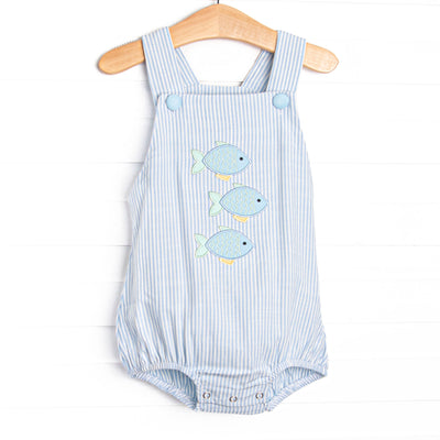 This bubble features a blue striped print, snaps on the stride, and a trio of fish appliques.