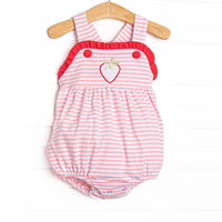 This bubble features a pink striped print, red ruffle trim, and a strawberry applique.