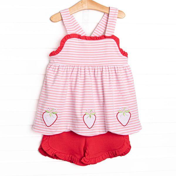 This set features a pink striped print, red ruffle trim, and a trio of strawberries appliques. Coordinating red ruffle shorts to match.