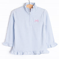  This pullover features light blue stripes, ruffle trim, and a pink bow embroidery. 