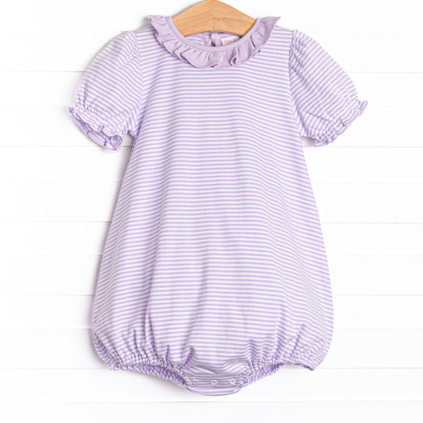 The Elena Pima Bubble features a purple striped print, ruffle collar, and our extremely soft pima cotton material.