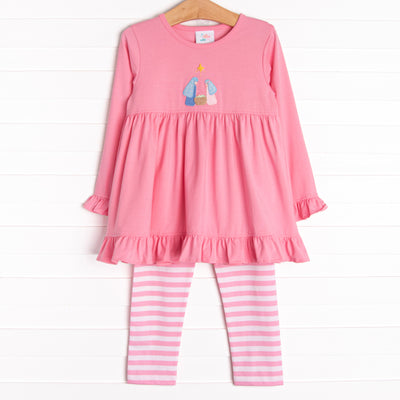 This set features a pink ruffle top with a nativity scene applique and pink striped leggings to match.