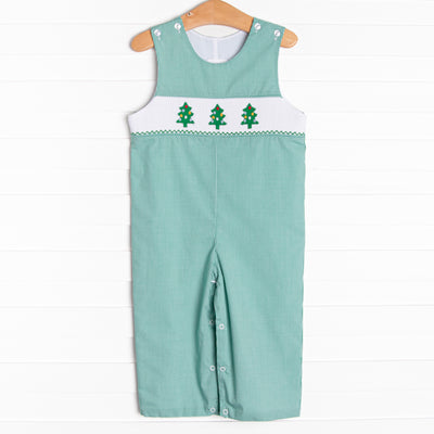 This classic jon jon is perfect for the holiday season! It is featured in green gingham with a trio of embroidered Christmas trees&nbsp;on a smocked panel across the chest.
