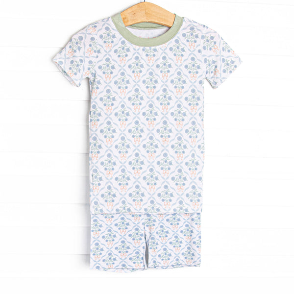 This set is made of the extremely soft, stretchy bamboo viscose fabric that feels like butter and features a blue floral and orange bow print.