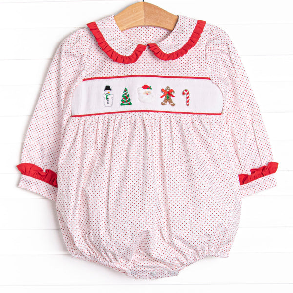  This bubble features a red bitty dot print, red ruffle trim, and an assortment of festive smockings. 