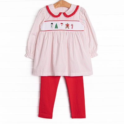 This set features a red bitty dot top with red ruffle trim and an assortment of festive smockings.
