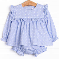 This set features periwinkle polka dots, ruffle trim, and matching diaper cover.