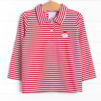  This top features a red striped print, a polo collar, and a Santa Claus applique. 