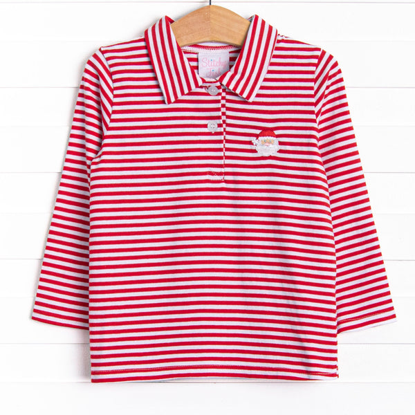  This top features a red striped print, a polo collar, and a Santa Claus applique. 