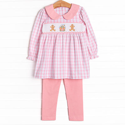 This set features a pink check print, a pink peter pan collar, and a ginger snap smocking. Coordinating pink leggings to match.