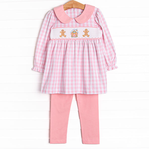 This set features a pink check print, a pink peter pan collar, and a ginger snap smocking. Coordinating pink leggings to match.